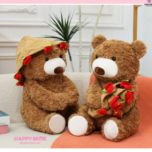 Gấu bông teddy dáng ngồi kèm mũ và ôm hoa hp203