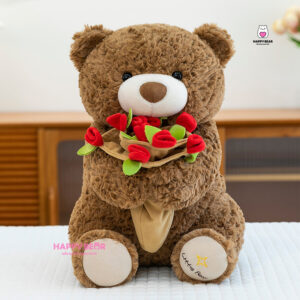 Gấu bông teddy dáng ngồi kèm mũ và ôm hoa hp203