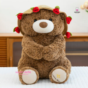 Gấu bông teddy dáng ngồi kèm mũ và ôm hoa hp203