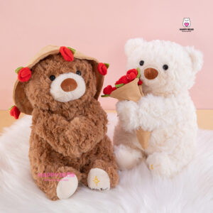 Gấu bông teddy dáng ngồi kèm mũ và ôm hoa hp203